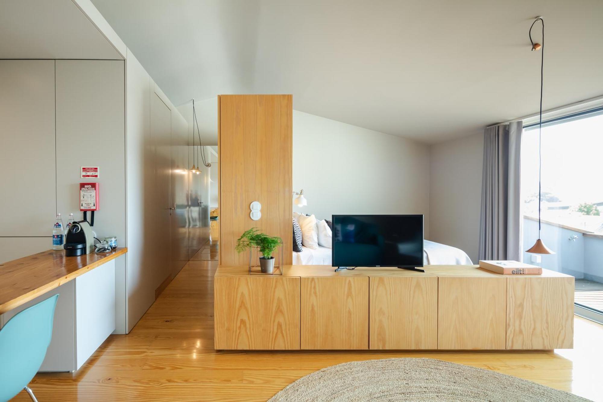 Baumhaus Serviced Living - Art & Design Apartments Porto Pokoj fotografie